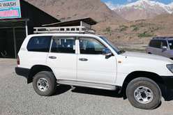 Toyota Land cruiser 100 - side view - Rent a car in Pamir, Tajikistan